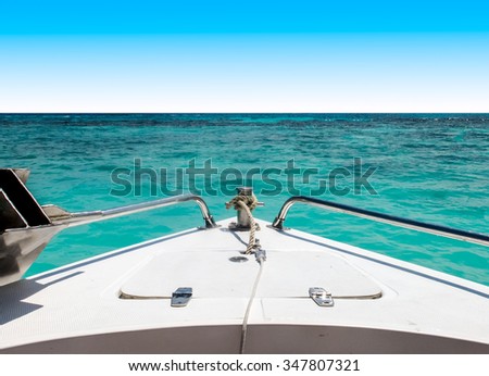 Start Journey to The Sea Concept, View of Speed Boat Moving with Seascape and Clear Sky in Background