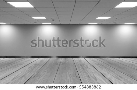 Perspective view Empty Space Monotone Black White Office Room with Row Ceiling LED Light Lamps and Lights Shade on Wall with Wooden Panel Floor for Gallery Interior / Mock Up Display Office Furniture