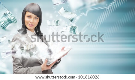 Portrait of a happy brunette woman with tablet computer - money appearing from the screen. Online commerce concept