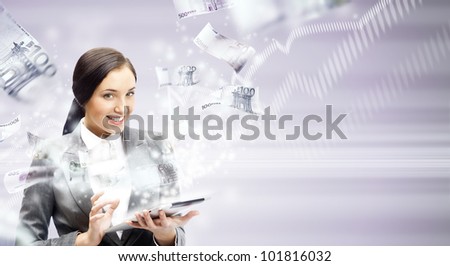 Portrait of a happy brunette woman with tablet computer - money appearing from the screen. Online commerce concept