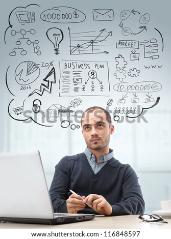 Young business man sitting at office looking up and planning. Graphic sketch style thoughts overhead