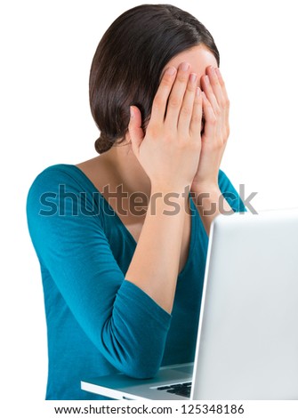 Young tired woman face palm working on laptop