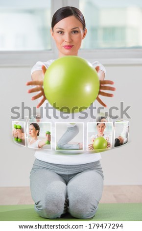 Woman with virtual pictures of her training program around her