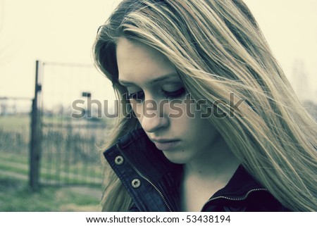 Dramatic portrait of young woman