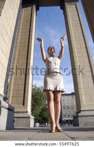 Young woman outdoors: at famous Novosibirsk Opera Theater