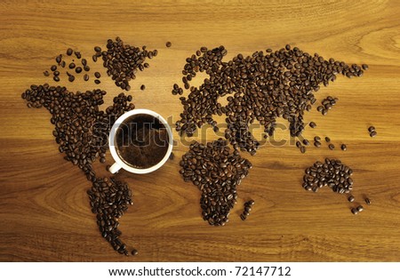 Beautiful coffee map on wooden background. International coffee industry concept