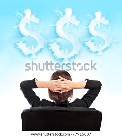 Closeup portrait of cute young relaxed business woman from behind with open hands behind her head. Dreaming about success and money concept