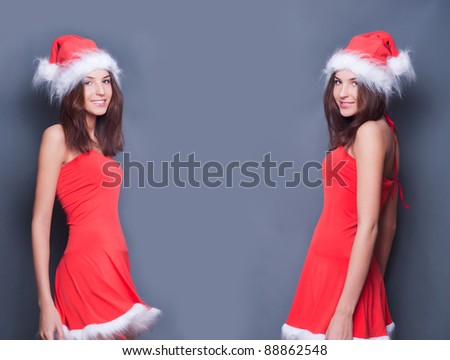 Portrait of two young twins women standing against each other. Copyspace for your text and logo between them.