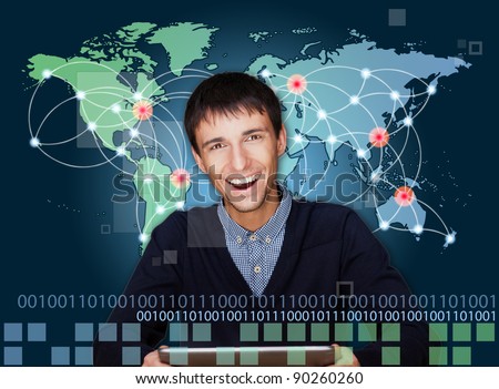 A business man is using the internet. A map of the Earth with glowing points of locations and lines of connections and technology images in the background.