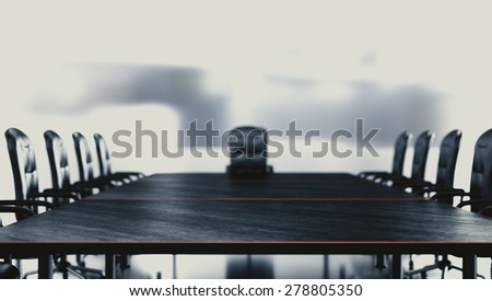 Business background concept of a view on a boss chair by conference table in an abstract white scenery. Camera focus on a nearby table surface.