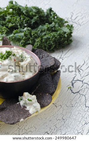 blue corn tortilla chips with ranch vegetable dip with kale
