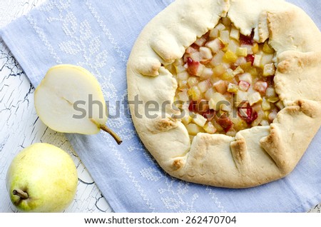 Apple pear galette. A galette is a rustic, free-form tart that is cooked on a baking sheet and can be prepared with a variety of seasonal fruits.