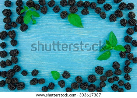 background for titles with blackberries and wood table