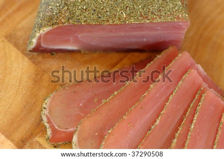 Traditional bulgarian dried beef sirloin in slices covered with cpicies