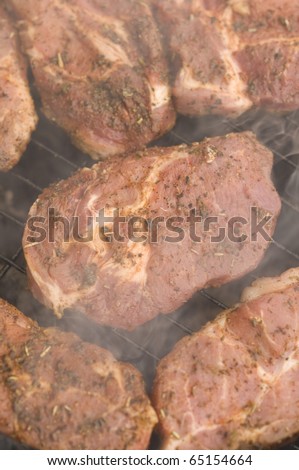 Preparing on barbecue juicy beef chuck