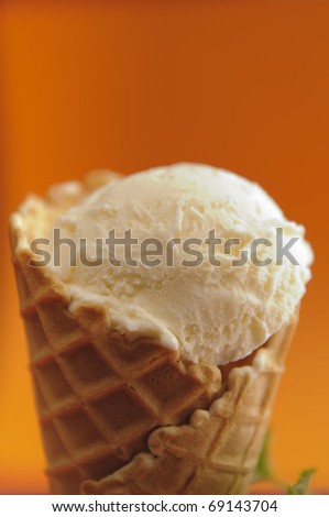 Vanilla ice cream in a waffle cone