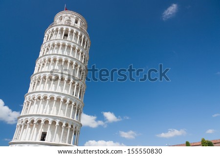 Leaning Tower of Pisa in Tuscany, one of the most recognized and famous buildings in the world. Free space for text.