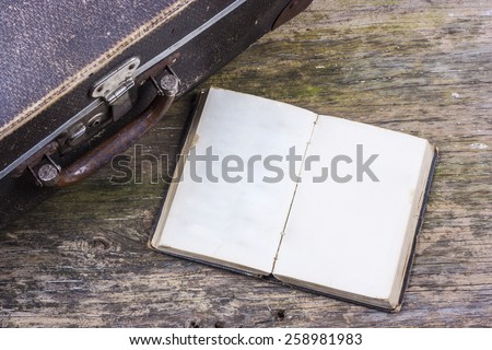 Old suitcase and diary for memories