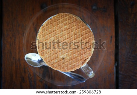 Dutch Caramel Waffle On Top Of A Cup Of Coffee