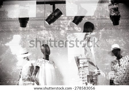 Male and female mannequins, black and white effect, fashion store, with natural double exposure and grunge effect