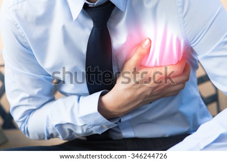 Man in office uniform having heart attack / heart burn