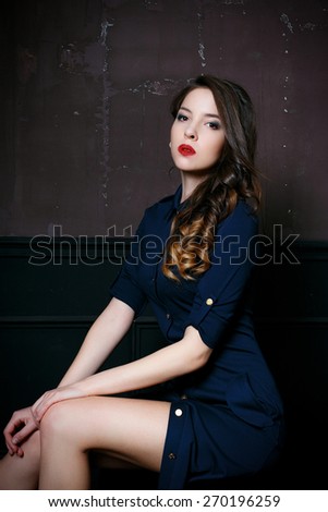 Woman in navy blue dress
