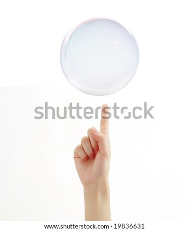 Hand with a hovering crystal ball on it