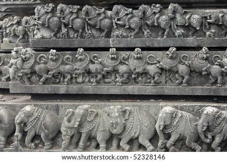 layered carvings around the famous ancient belur temple in karnataka state, india. Construction of the Chenna  Keshava Hindu temple began in 1116 AD, and took more than 100 years to complete.