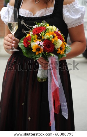 stock photo Bride with Champagne and wedding bouquet