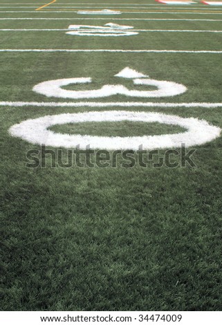 close-up of The number thirty on an american football field