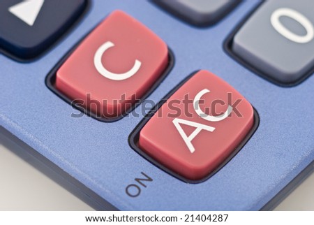 calculating machine on white background closeup