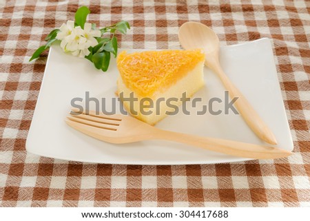 Gold Egg Yolks Thread cake on white dish