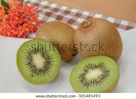 kiwi fresh fruit on white dish