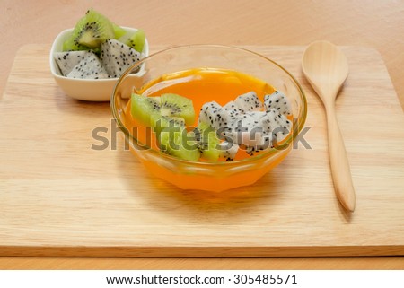 Homemade Orange jelly with dragon-fruit and kiwi fresh fruit