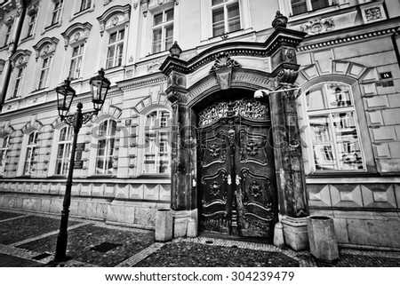 Black and white old majestic door in Prague