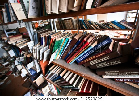 MOSCOW,RUSSIA APR 20,2013: Bookcases in the library of the abandoned automobile factory \