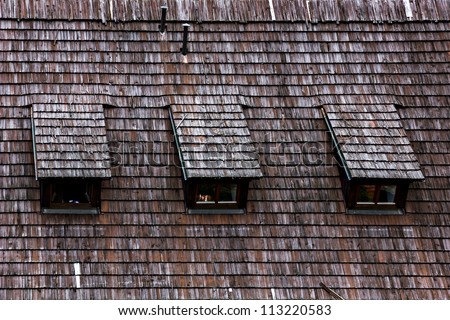 Wood shingle roof texture. Garret roof. Architectural textured  background.