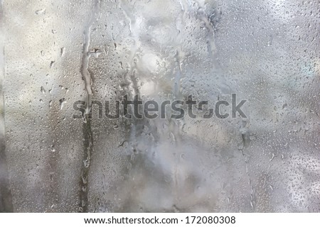 Texture Of Frozen Drops On Frosted Glass. Abstract Winter Textured Background.
