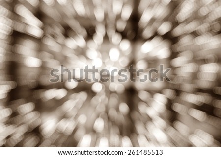 Festive blur background with bright lights on sepia