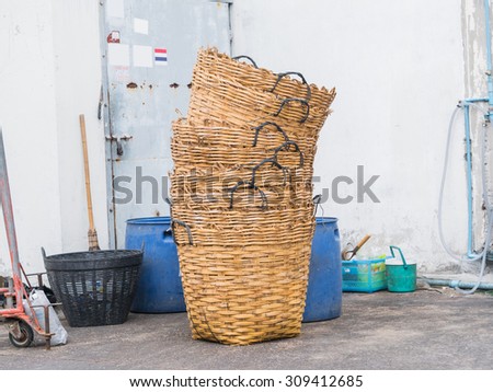 Stack of empty basketry bins.