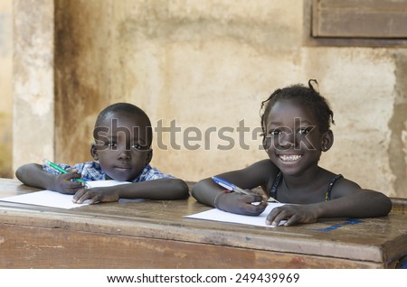 Cute Little Children Learning with Pens and Paper in Africa (Schooling Education Symbol)