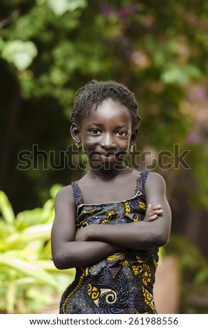 Confident and Proud African Girl Posing. In the streets of Bamako, an African girl is posing for the camera.