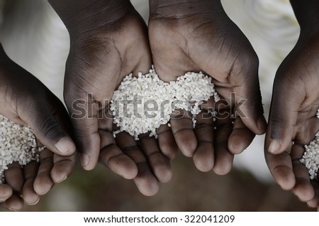 African Children Malnutrition, Starvation, Stunted Problem Symbol Hands Cupped. Get food and life-saving aid to the world\'s most vulnerable people and countries. Stop hunger in the world!