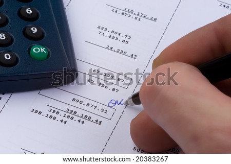 writing the word 'ok' on an account print-out