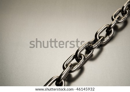 a metal chain on a steel background