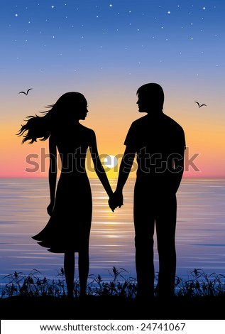 Holding Hands In Sunset. standing and holding hands