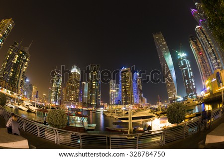 DUBAI - NOVEMBER 08: Dubai Marina skyline. Dubai Marina skyscrapers, Cayan Tower, Princess Tower on November 08, 2014 in Dubai