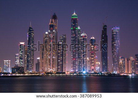 Dubai Marina night skyline. Dubai Marina bay. Dubai marina skyscrapers. Dubai skyline. Dubai by night.Dubai cityscape. Dubai Cayan tower, Marina 101, Princess tower. Modern city.