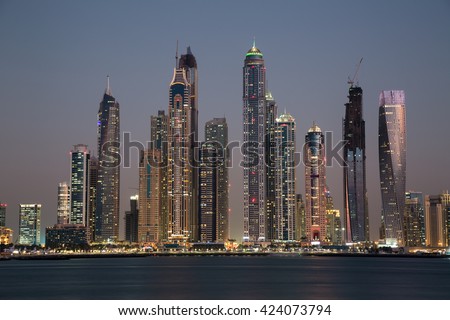 Dubai skyscrapers. Dubai Marina panoramic view, skyline, cityscape. Dubai evening skyline. Dubai sunset. Dubai futuristic skyline. Dubai Marina skyscrapers Princess Tower, Cayan tower, Marina 101.
