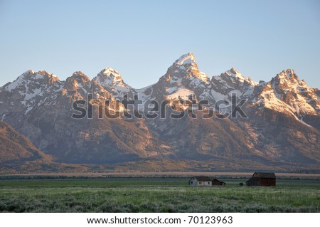 ranch house near mountains